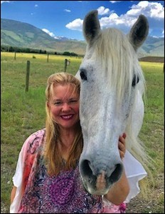 Woman with white horse