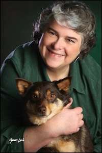 Woman holding small dog